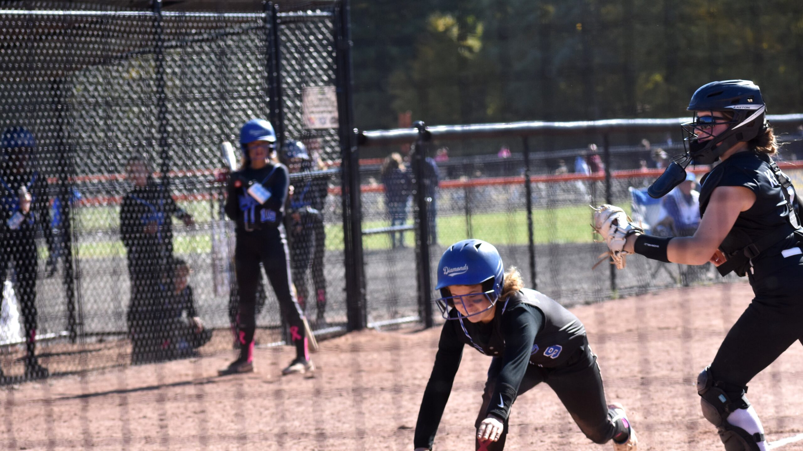 Diamond Club play at the plate